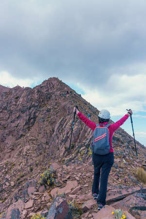 Young woman with backpack in malinche volcano