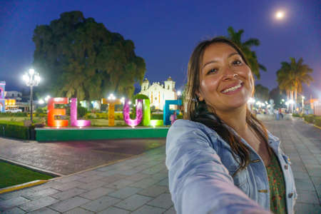 woman taking a selfie in el tule oaxaca mexico