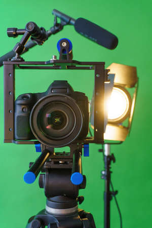 camera,microphone, lights and a green screenの写真素材
