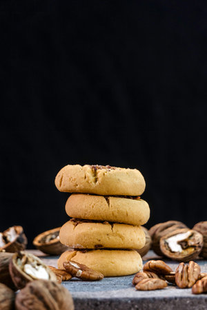walnut cookies on a black background