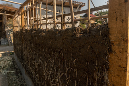 bioconstruction, earthen walls built with straw and mudの写真素材