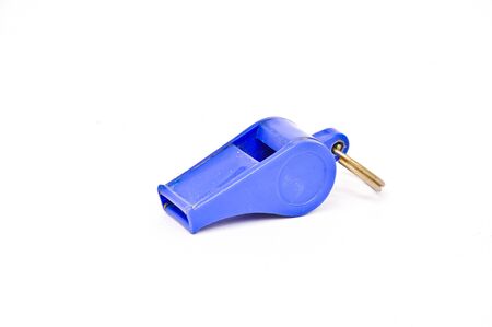 Old Blue plastic Whistle on white backgroundの写真素材