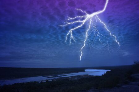 Thunder in the dark night over the river