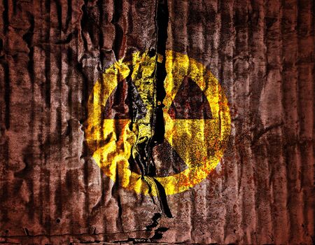 sign of radiation, nuclear warning on grunge metal texture backgroundの写真素材
