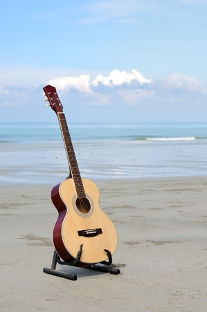 Guitar on the beach.の写真素材