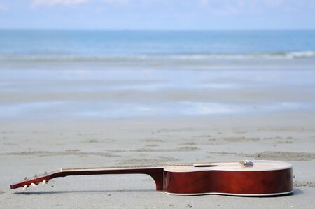 Guitar on the beach.