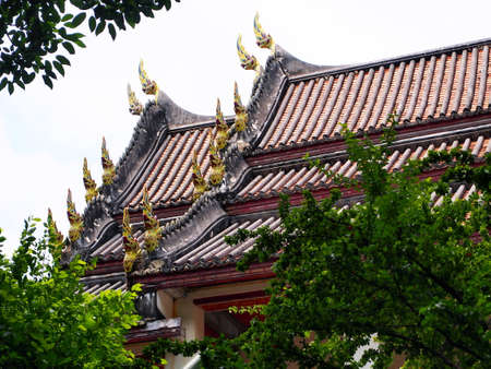 The ceramic decorated at roof parts of the old temple of Wat Chaloem Phrakiat Nonthaburi Thailand.