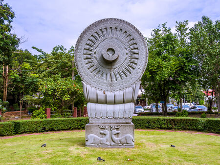 Dharmacakra and two deers Crouch in Thailand.の写真素材