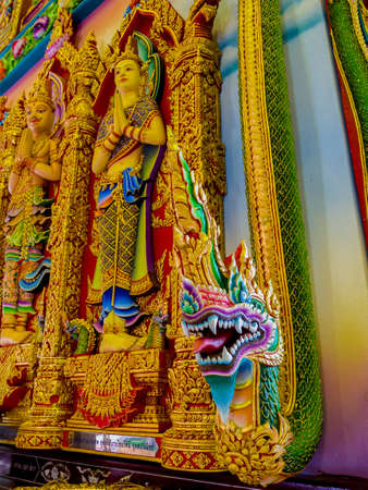 Thai dragon or naga painted stucco in Thailand church.のeditorial素材