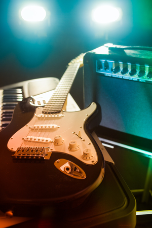 Guitar and piano keyboard.の写真素材