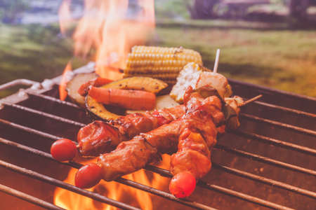 Barbecue in garden at summerの写真素材