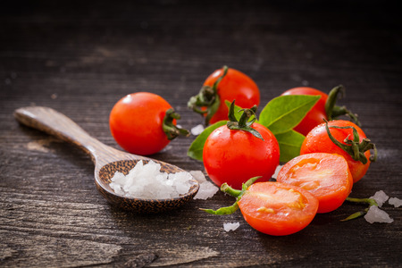 Fresh cherry tomatoes on table.の写真素材