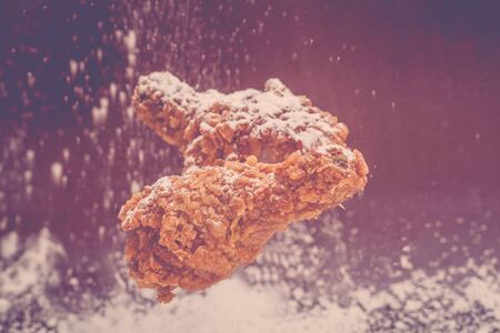 Cooking in kitchen flour and fried chickenの写真素材