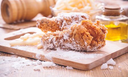 Cooking in kitchen flour and fried chickenの写真素材