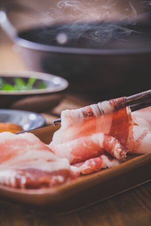 Beef and pork slices for Sukiyakiの写真素材