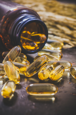 Rice bran oil capsule with riceの写真素材