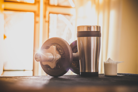 protein shaker and dumbbellsの写真素材