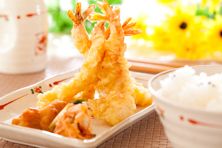 Tempura shrimps and kimchi with rice.の写真素材