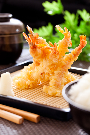 Tempura shrimps and kimchi with rice.の写真素材