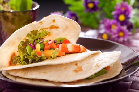 Shrimp with vegetables wrapped in a tortilla