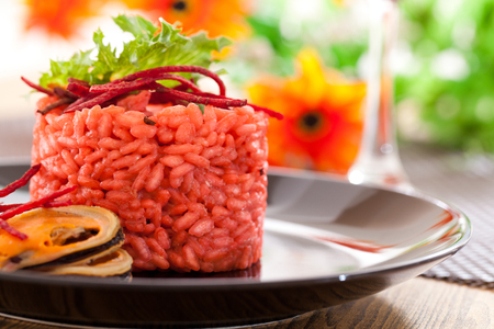 Beetroot risotto with shellfishの写真素材