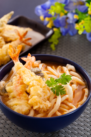 Udon japanese noodles with tempuraの写真素材