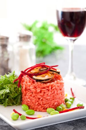 Beetroot risotto with shellfishの写真素材