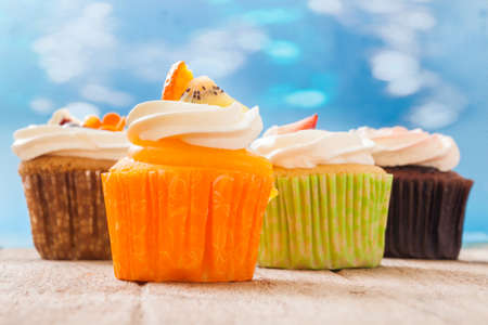 Birthday cupcakes in  colorful colorsの写真素材
