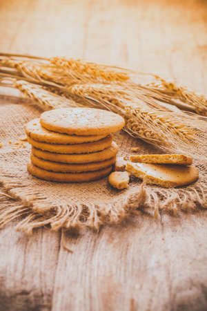 Stack of biscuits with wheatの写真素材