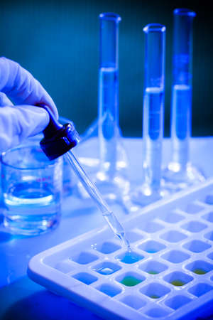 Microbiological pipette in the genetic laboratory