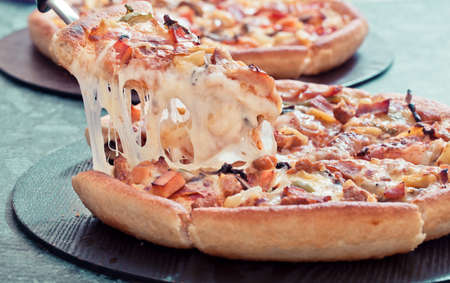 Delicious italian pizzas served on wood