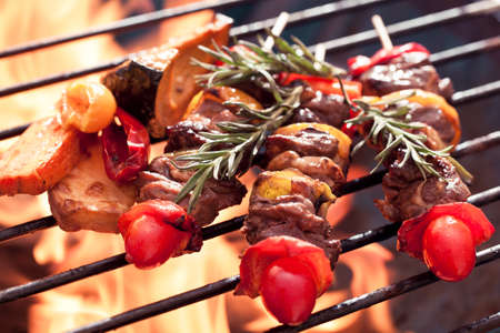 Beef bbq on grill with fireの写真素材