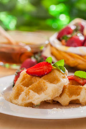 Homemade Belgian Waffles with Strawberries and  Syrupの写真素材