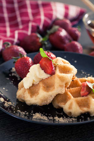 Homemade Belgian Waffles with Strawberries and  Syrup