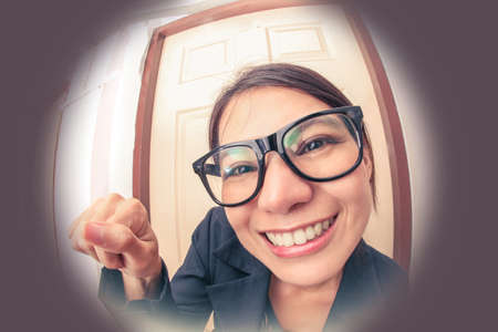 Saleswoman knocking  doors