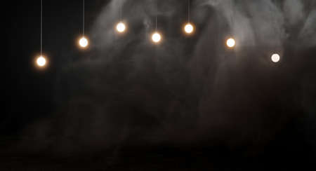 Light bulbs on dark smoke background.3d rendering.の写真素材