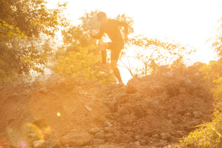 Trail running at the sunset