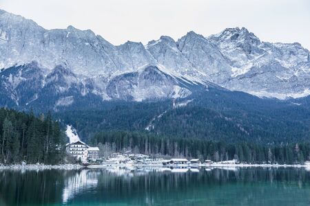 Winter landscape with lake and mountains, Zugspitze, Aibsee, Germanyの写真素材