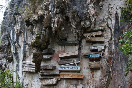 Close-up picture of a mountain-wall with some hanging coffins, Sagada, Luzon, Philippinesの写真素材