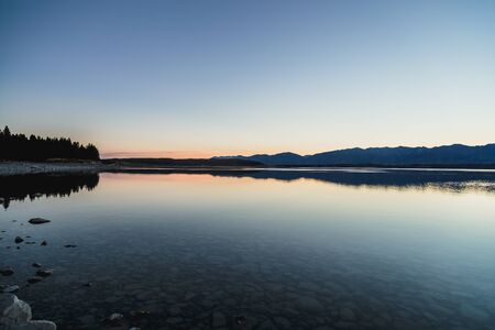 Sunset colors and reflection at Mount Cook the Aoraki/Mount Cook National Park, South island, New Zealandの写真素材