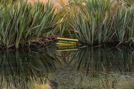 eglinton valley, mirror lakes along the way of milford road in new zealand.