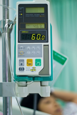 sick girl sleeping in hospital bedの写真素材