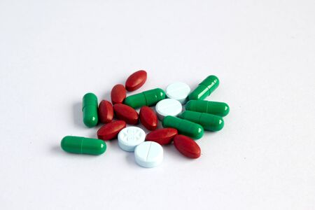 Pills pouring from the pill bottleの写真素材