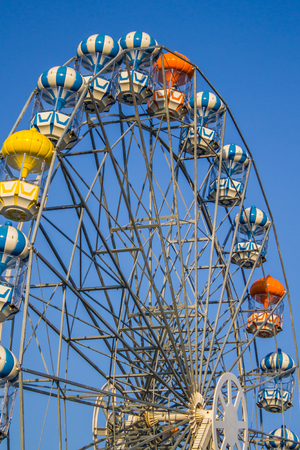 ferris wheel and the blue skyの写真素材