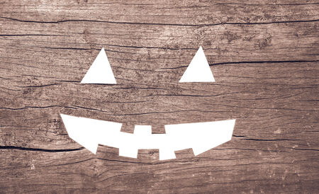 Halloween face on rustic woodの写真素材