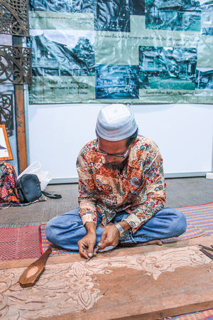 local Thai carpenter making  the wood door artのeditorial素材