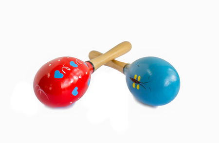 red and blue maracas isolated on white backgroundの写真素材