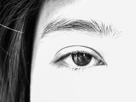 Asian teenager black eyes in black and white toneの写真素材