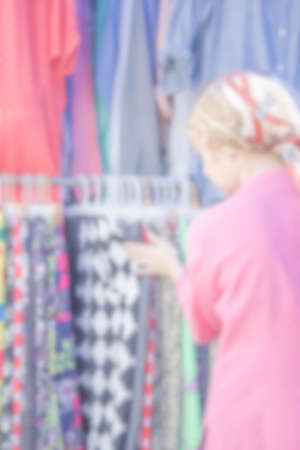 blur photo of Asian woman shopping clothesの写真素材