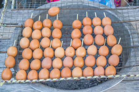 grilled eggs at Thai marketの写真素材